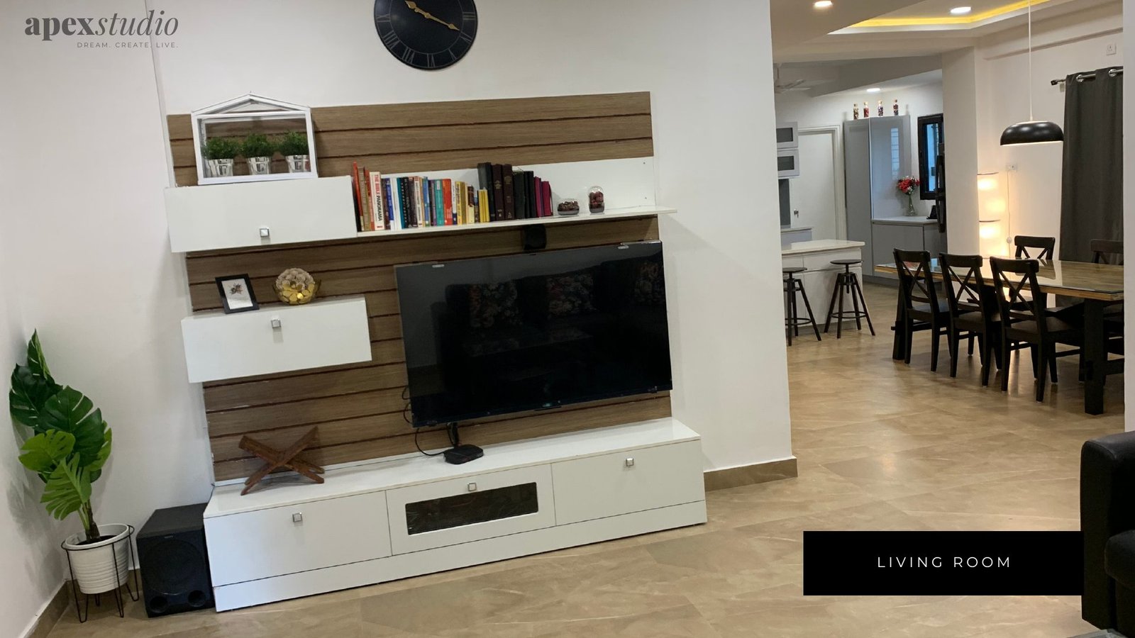 Suroma Residency living room TV unit with wood slat panel